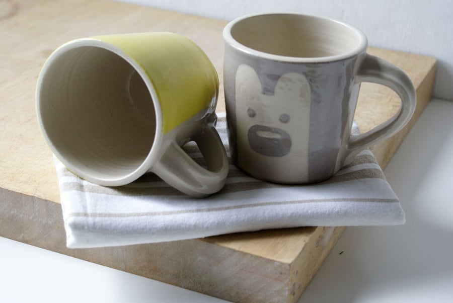 SECONDS SALE - Two tall yellow and grey bear mugs glazed in simply clay
