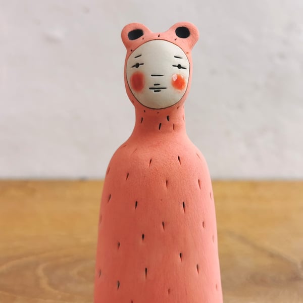 Ceramic figurine Peculiar Person ornament in salmon pink