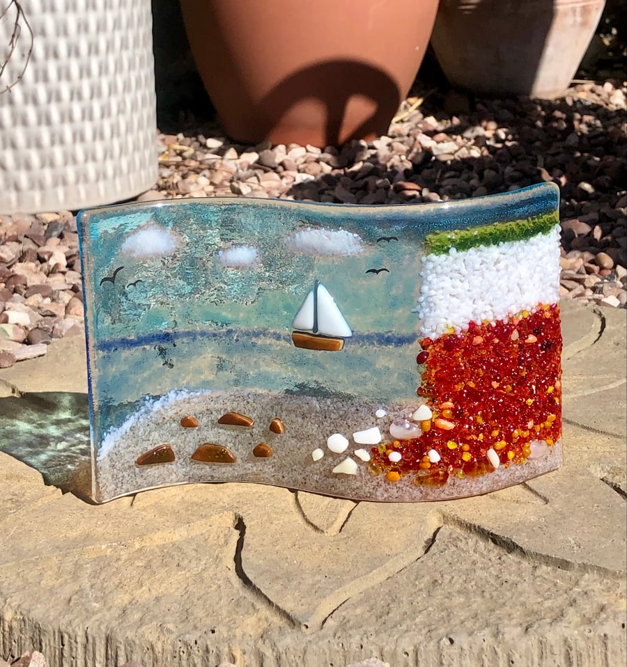 Fused glass wave ornament of Norfolk Hunstanton cliffs beach and boat 