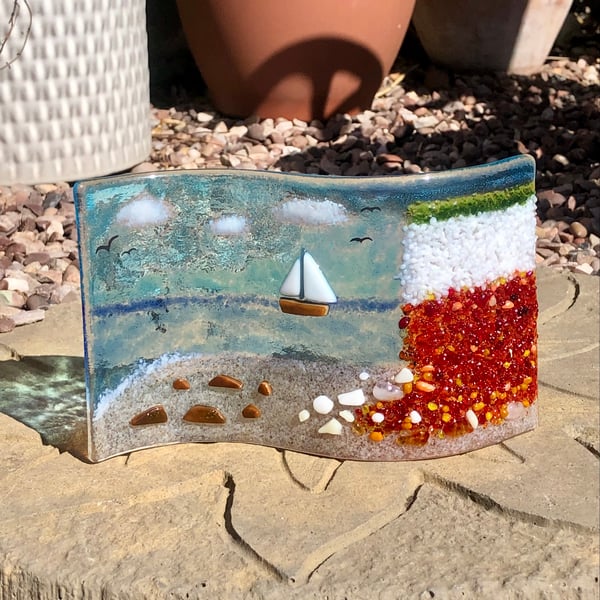 Fused glass wave ornament of Norfolk Hunstanton cliffs beach and boat 