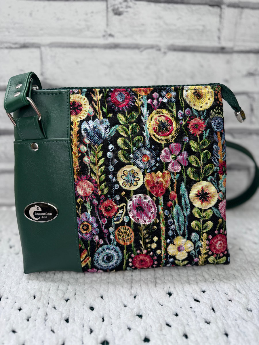 Crossbody bag in Multi-coloured flower tabestry fabric and green faux leather 