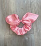Large pink satin bow scrunchies 