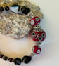 Capricorn January birthday charm bracelet featuring garnet and onyx - Image 2