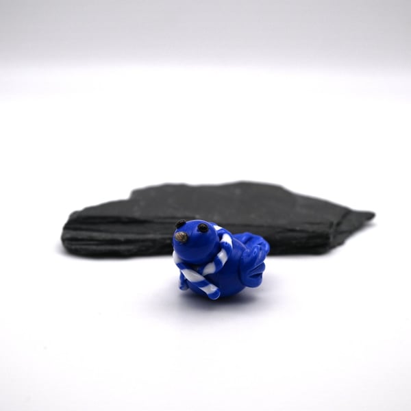 small glass blue football bird