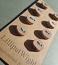 Set of eight small flat driftwood buttons - Image 5