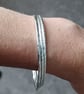 Set of three silver stacking bangles - Image 4