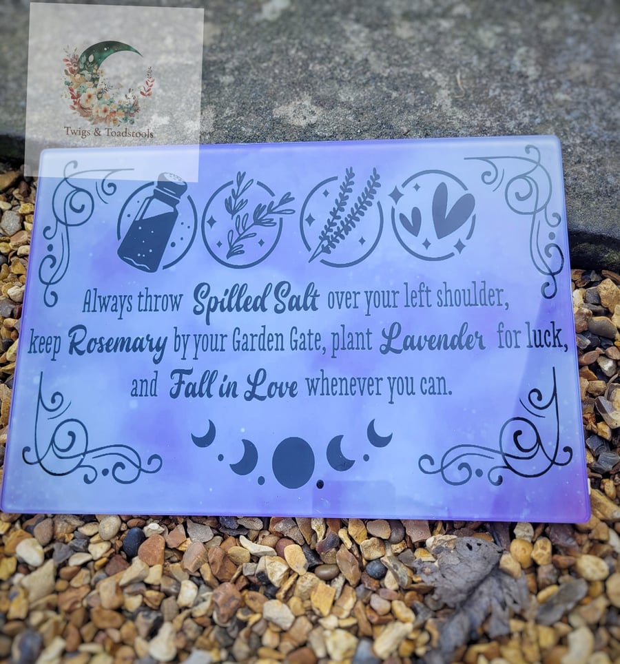 Practical magic quote glass chopping board 