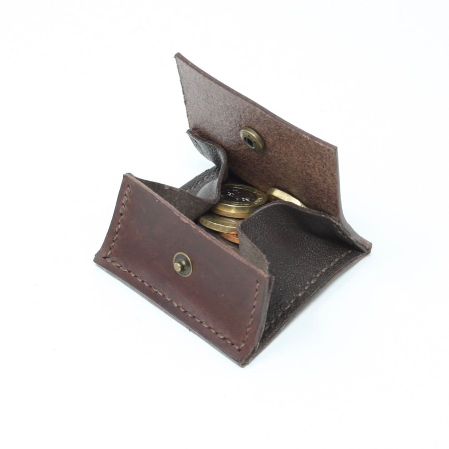 Square brown leather coin purse; fold out design