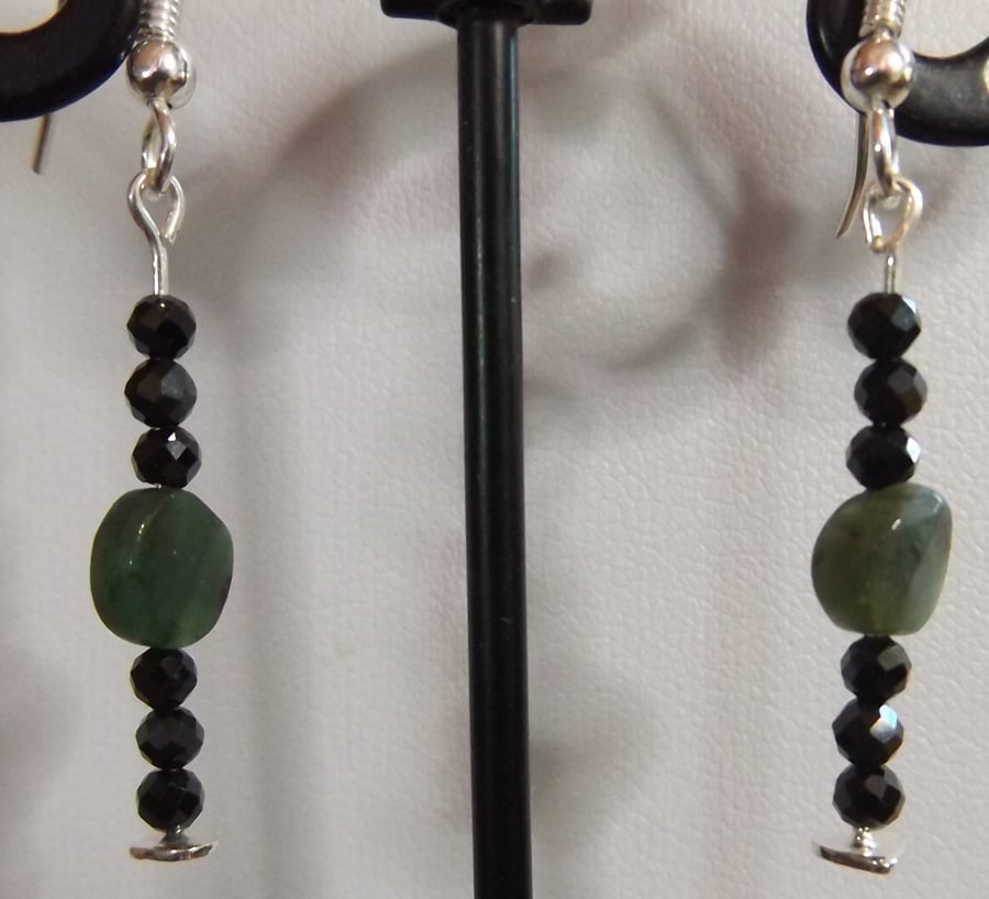 Emerald coin earrings with black faceted spinel