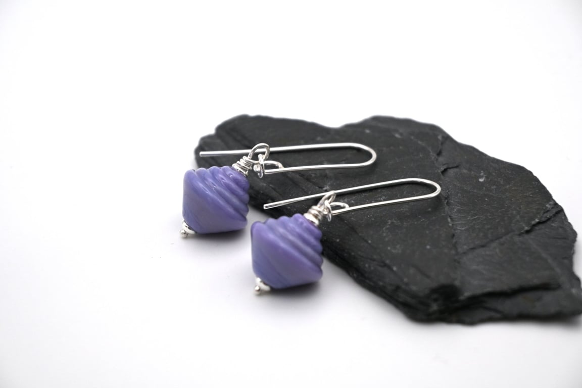purple lampwork glass spinning top earrings