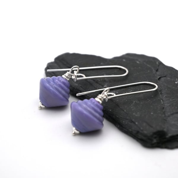 purple lampwork glass spinning top earrings