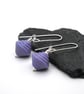 purple lampwork glass spinning top earrings