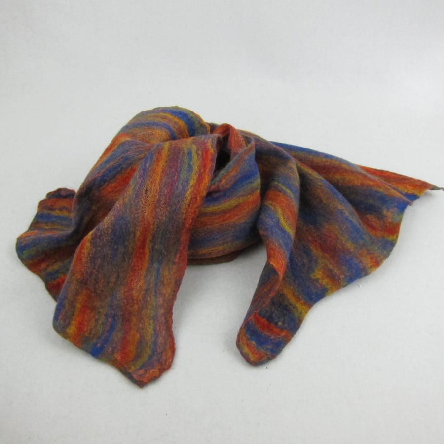 Nuno felted scarf, rainbow merino wool on red cotton gauze