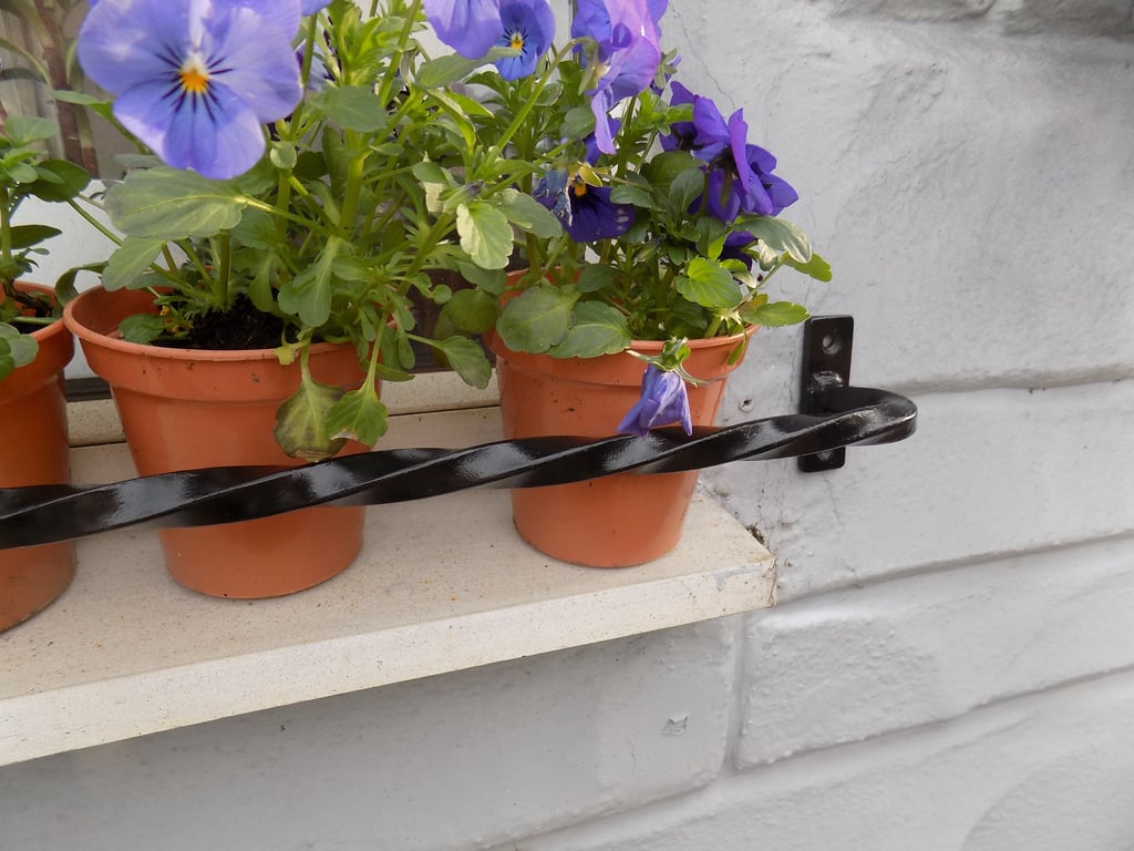 Twisted Window or Balcony Rail......................Wrought Iron (Forged Steel) 