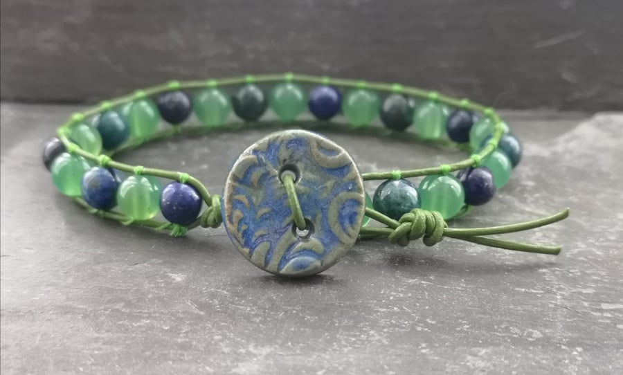 Blue and green mixed gemstone and leather bracelet with ceramic button fastener 