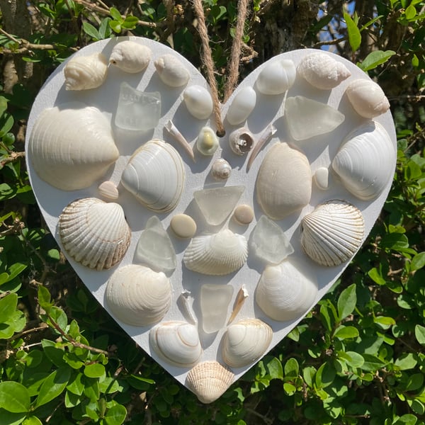 Hanging wood heart decorated with sea glass and shells from Cornish beaches 