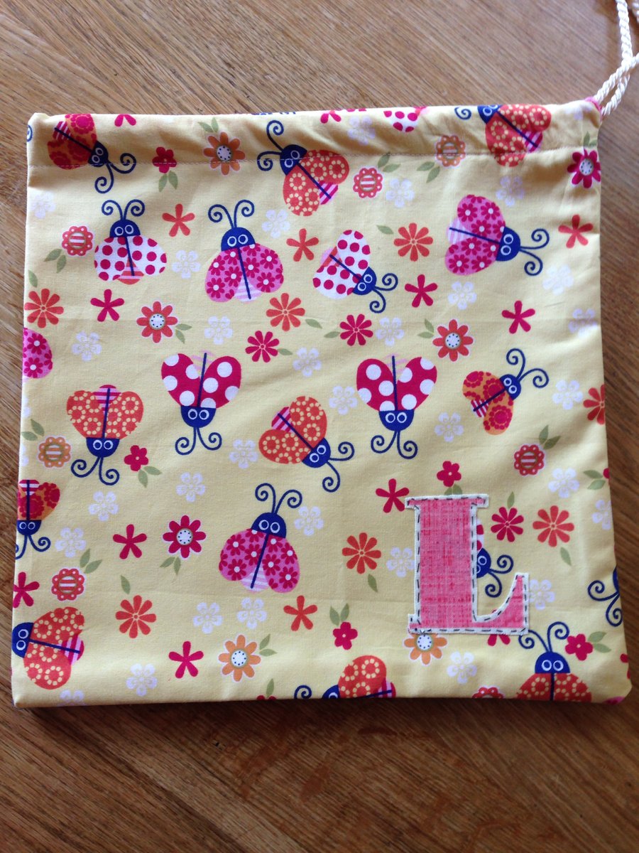 Child's ladybird wash bag with personalised initial - L