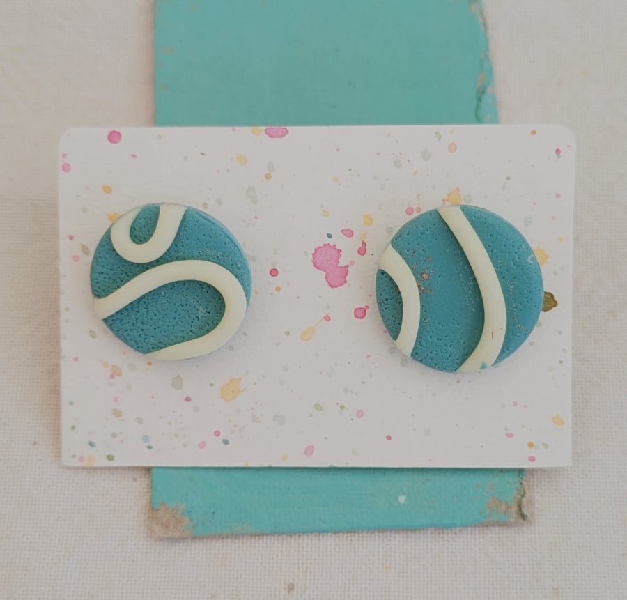 Glow in the dark big blue stud earrings