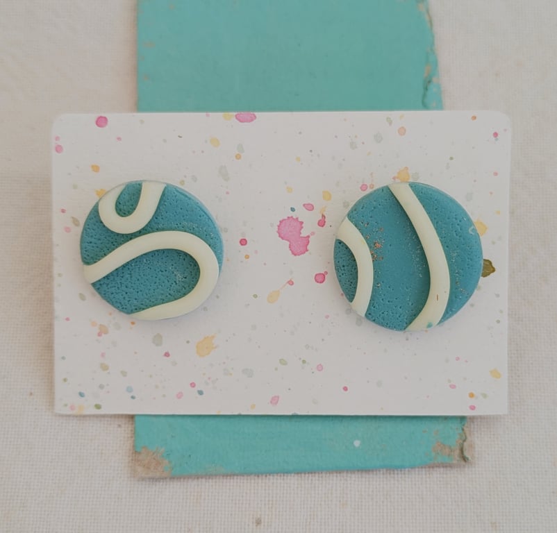 Glow in the dark big blue stud earrings