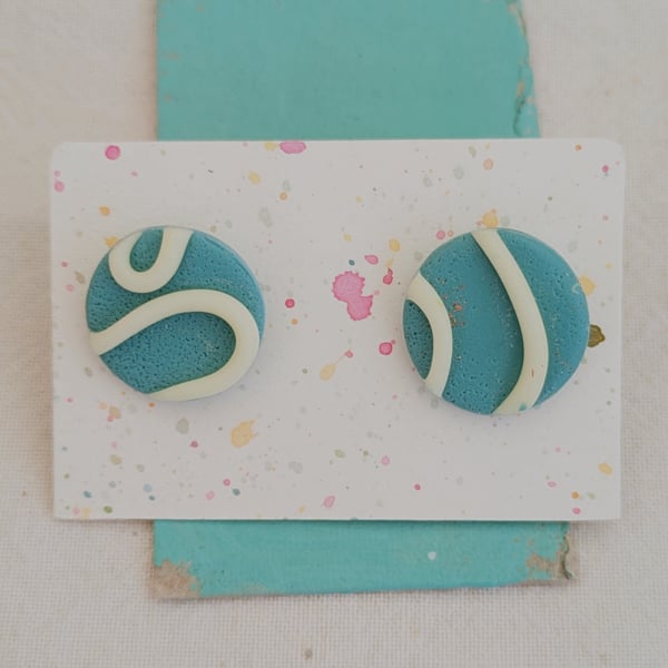Glow in the dark big blue stud earrings