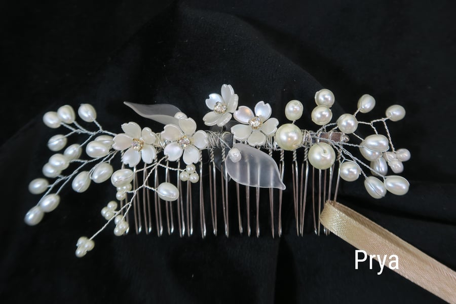 Wedding hair comb, glass pearls, flowers and leaves. Bridal hair accessory