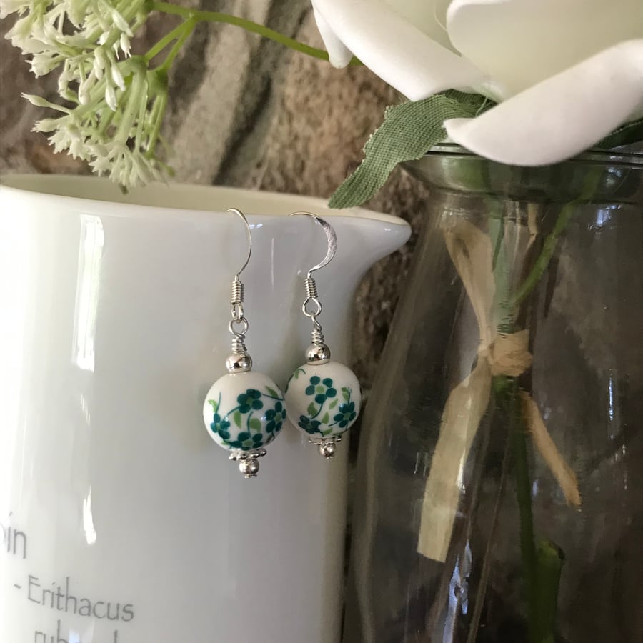 Green floral earrings