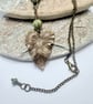 Sage green Czech glass and brass leaf pendant and earrings set, boho jewellery - Image 7