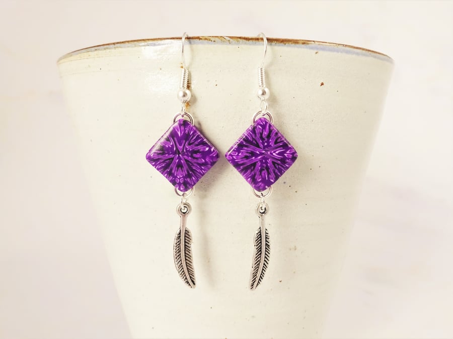 Patterned Purple Drop Earrings With Feather Charms