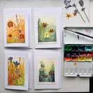Watercolour and pressed flowers pack of Four cards 