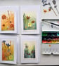 Watercolour and pressed flowers pack of Four cards 
