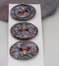 3 Medium Oval Bronze Brocade Pattern Ceramic Buttons - Image 1