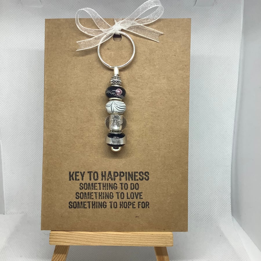 A hand made keyring attached to an A6 hand stamped greetings card.