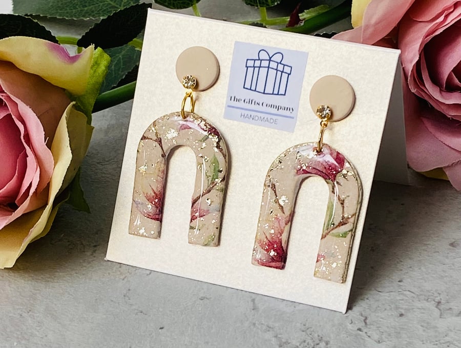 Floral, lily polymer clay, gold plated dangle earrings, finished with resin