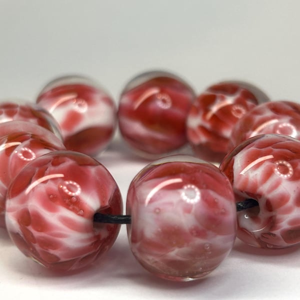 Handmade pink and white patterned lamp work glass beads