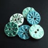 set of six small ceramic Christmas snowflake buttons