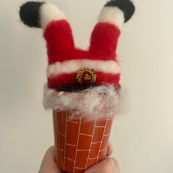 Santa going down the chimney 