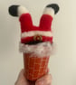 Santa going down the chimney 