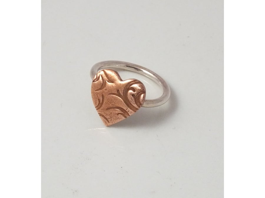 Copper and silver heart shaped ring
