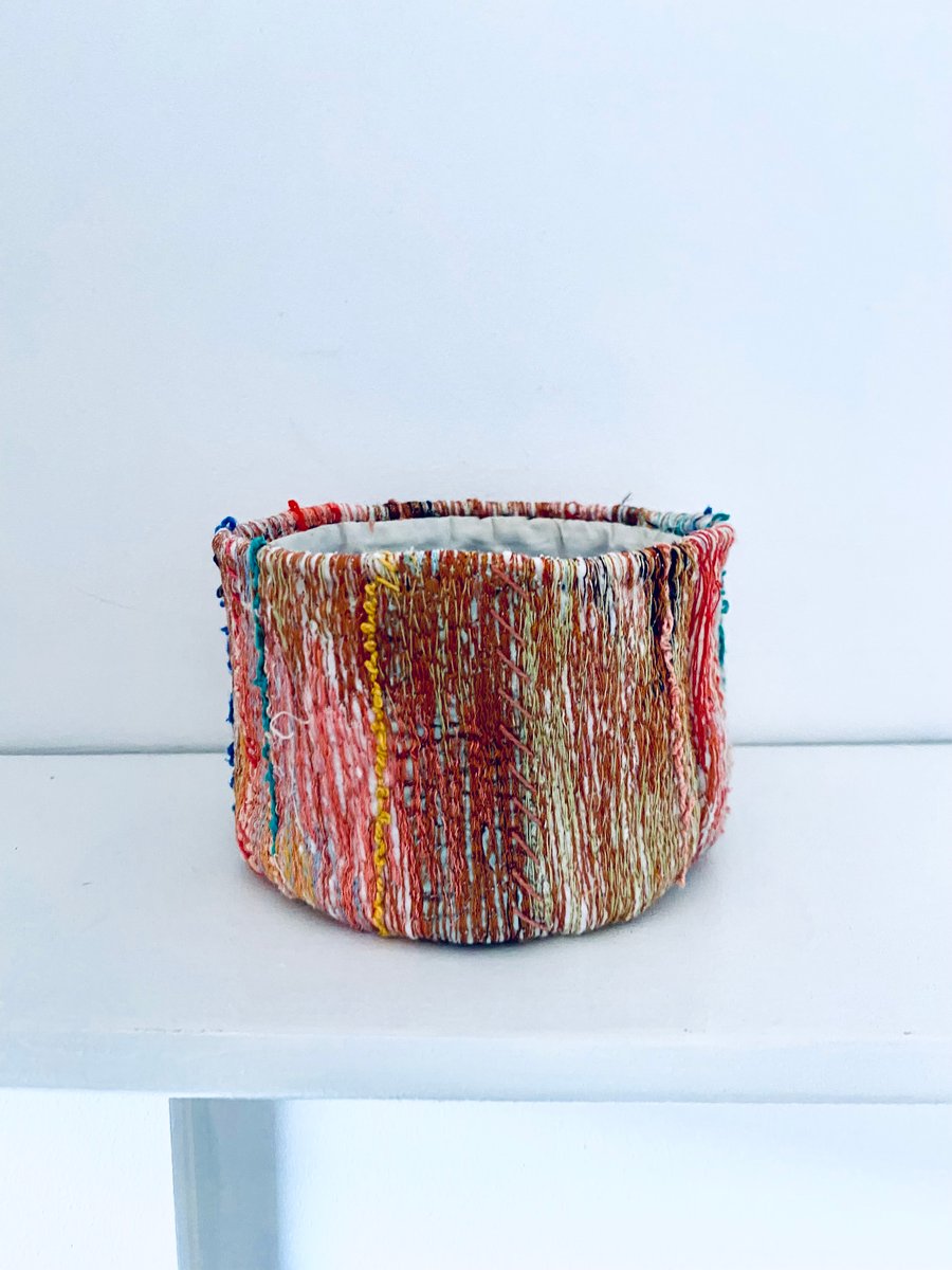 Tactile textile plant holder, storage pot