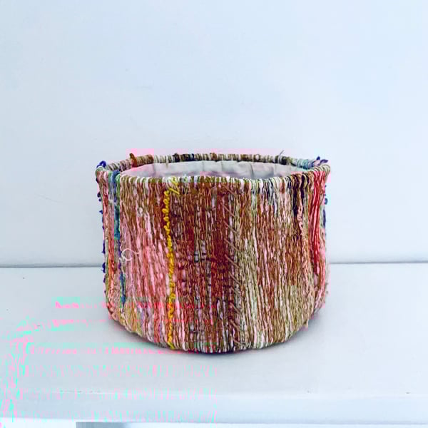 Tactile textile plant holder, storage pot