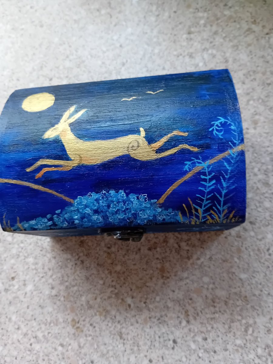Beautiful blue box with golden hare