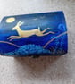 Beautiful blue box with golden hare