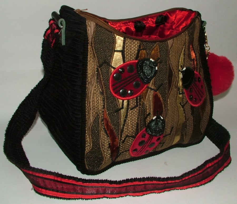 Brown and red LadyBird Handbag