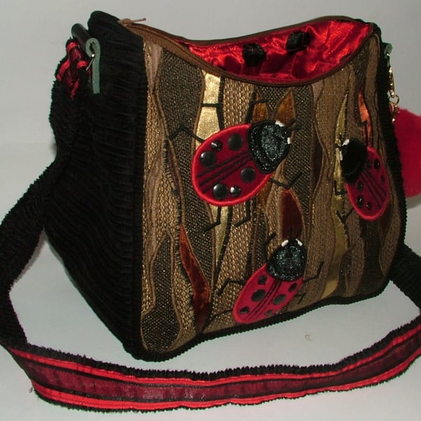 Brown and red LadyBird Handbag