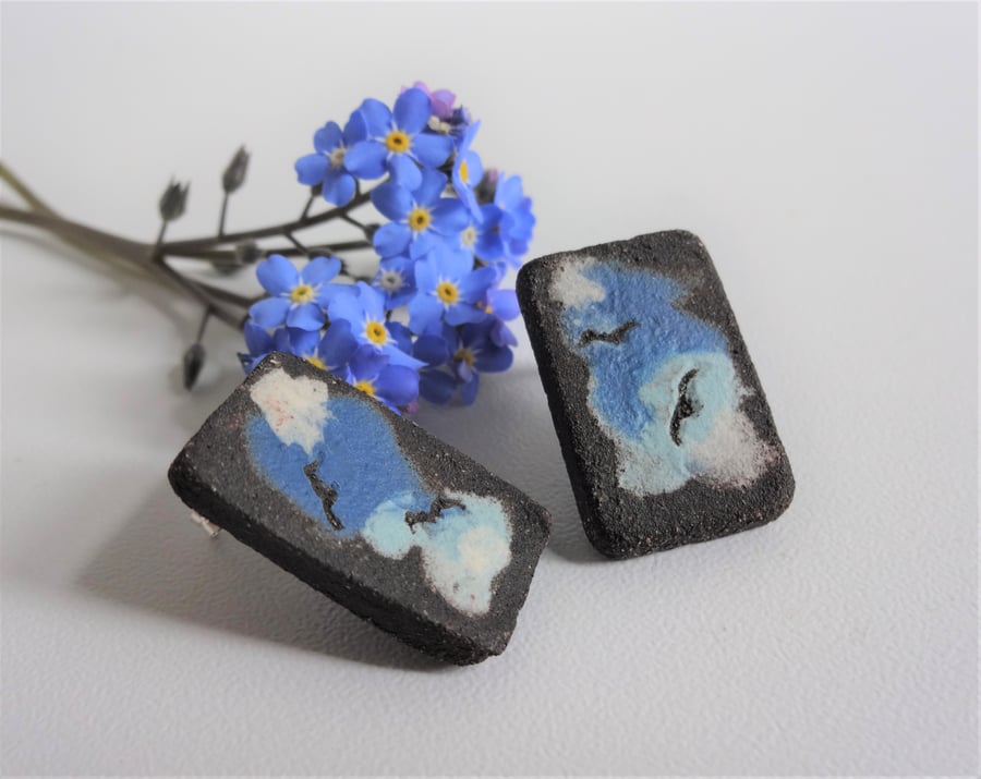 Handmade ceramic earrings. Birds and clouds design, sterling silver fittings.