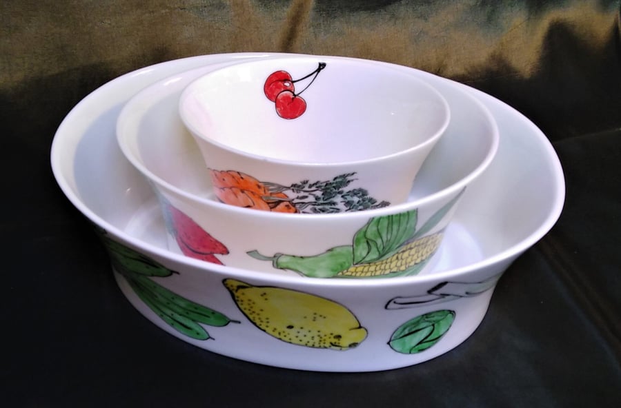 Fruit and Veg. A set of three pure white bone china oval bowls each hand decorat