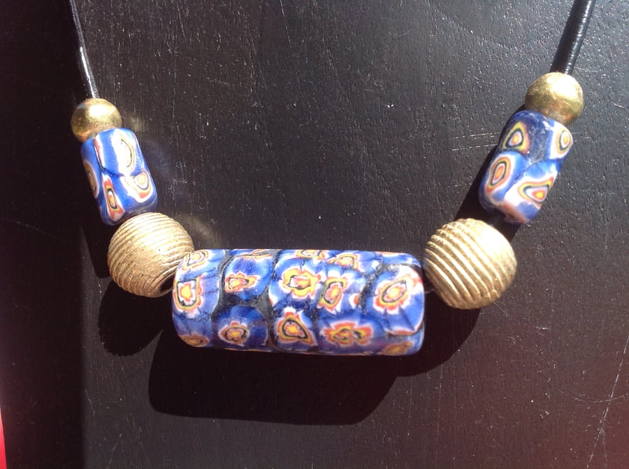 Chunky beaded necklace with brass beads from Africa and blue ones from Nepal
