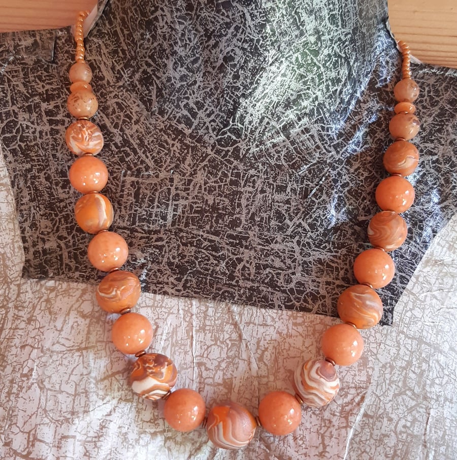 Orange, cream and sienna polymer clay necklace