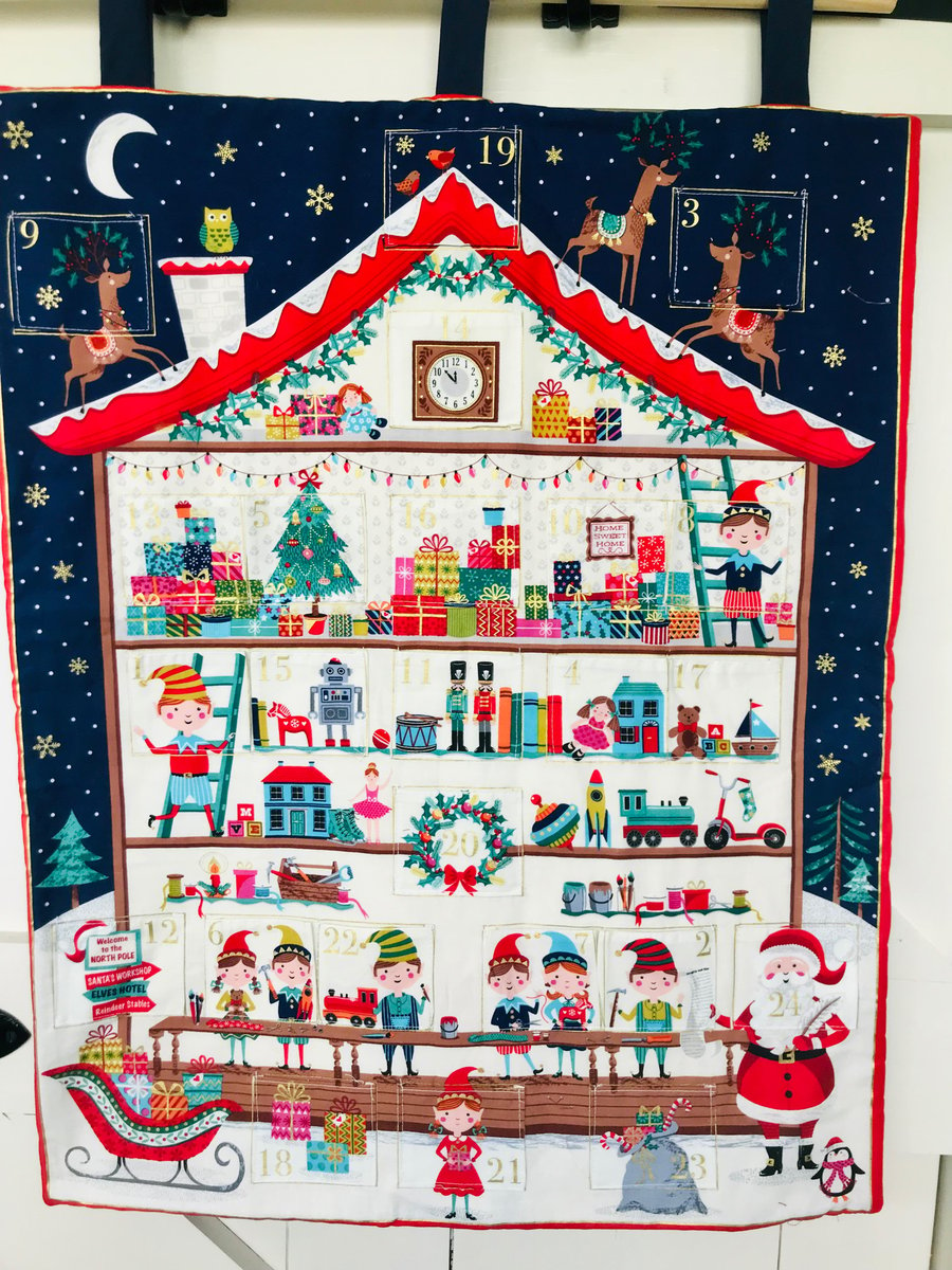 Reusable fabric advent calendar Santa’s workshop