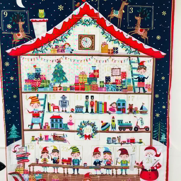 Reusable fabric advent calendar Santa’s workshop